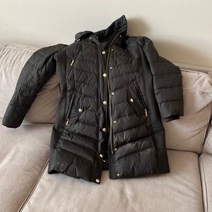 Army green jacket some stains at bottom photo shown able to be cleaned